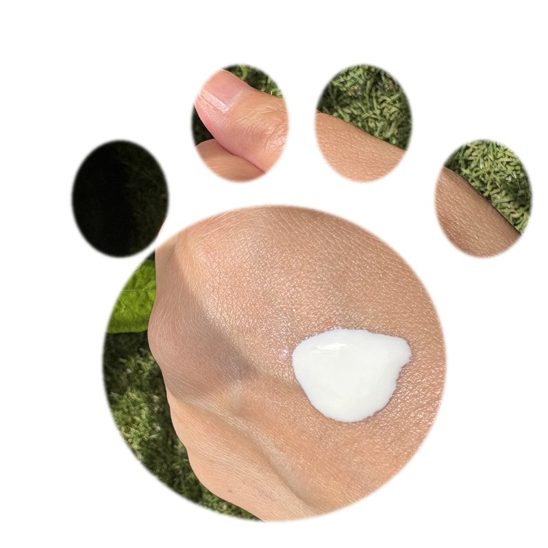 ANESSA Perfect UV Skincare Milk texture swatch in a cat paw shape