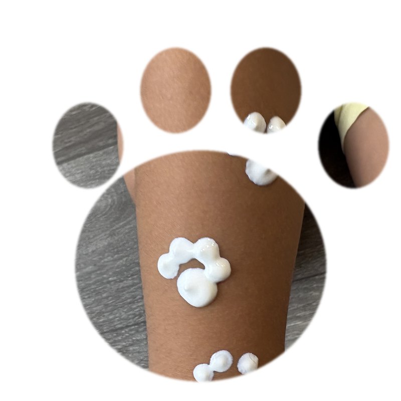Biore Kids UV Stamp sunscreen paw prints on a child's arm in a cat paw shape