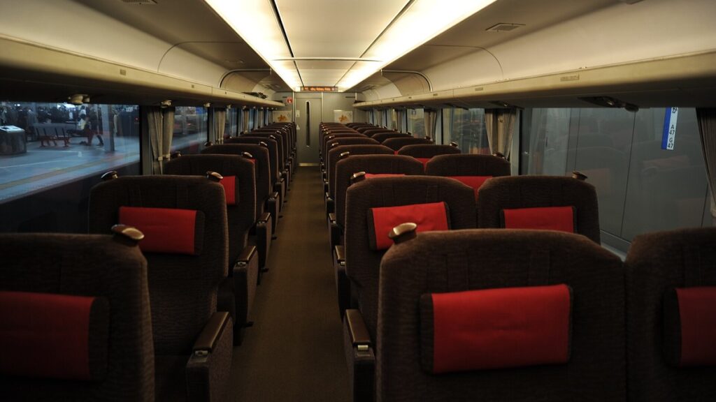 Green Car seats inside a Thunderbird limited express